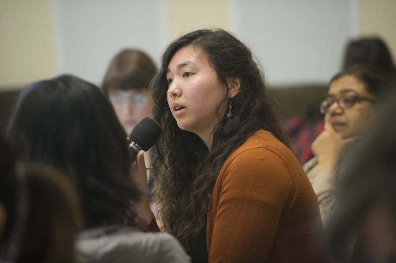 Participants ask questions at Feminist Research Institute symposium