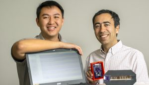 Daniel Fong (left) an electrical and computer engineering Ph.D. student, and Soheil Ghiasi (right), a professor of electrical and computer engineering, are photographed in Ghiasi's lab in Kemper Hall, February 2020. Ghiasi and Fong have invented a patented device that can measure blood oxygen saturation in a fetus through the maternal abdomen.)