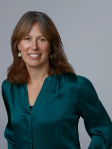 portrait image of Penny Norquist against a plain light gray background