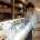 Lab technician working at bench in lab.
