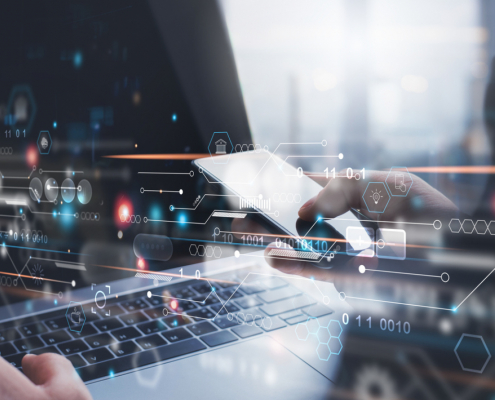 abstract image of person working on computer with information exchanged
