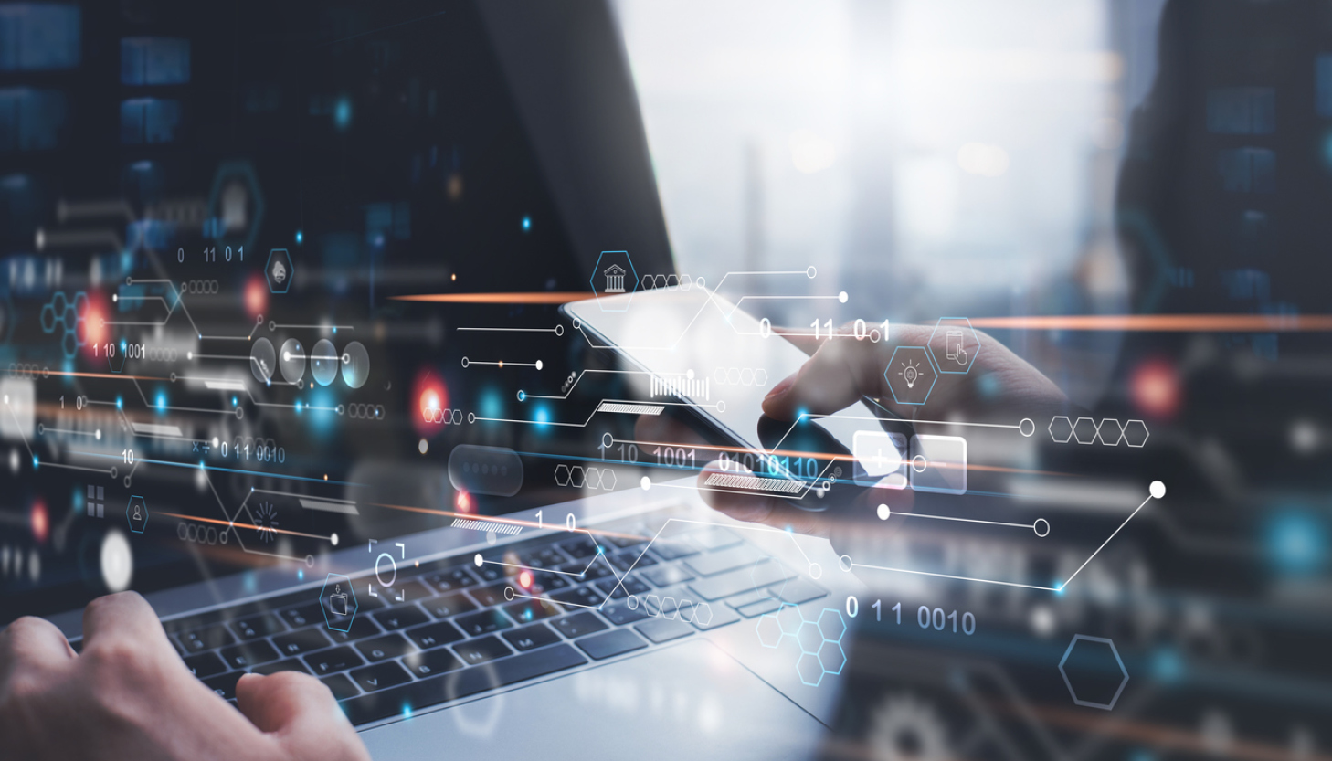 abstract image of person working on computer with information exchanged
