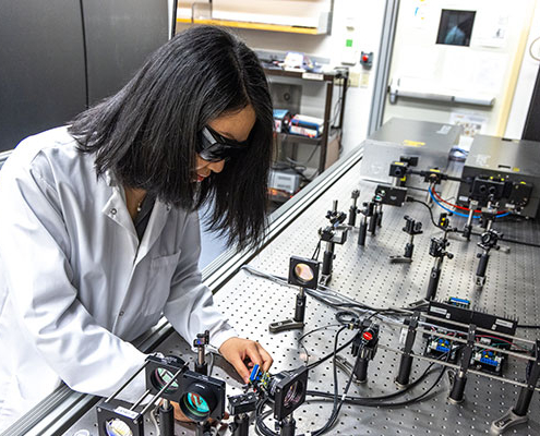 Lab worker working at bench