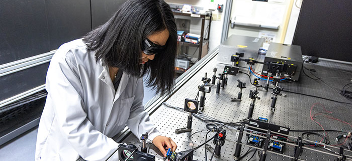 Lab worker working at bench