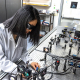 Lab worker working at bench