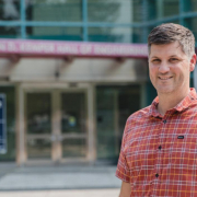 Professor Sam King standing in front of Kemper
